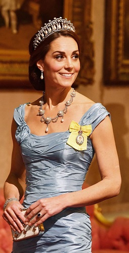 An elegant up-do topped with a tiara for a State Banquet in honour of King Willem-Alexander and Queen Maxima of the Netherlands at Buckingham Palace.